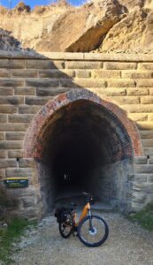 Central Cycle Trail Co. Bike on the Otago Central Rail Trail, about to go through tunnel on way to MIddlemarch.